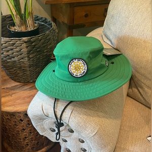 Brand new. Never worn. Green Bucket hat